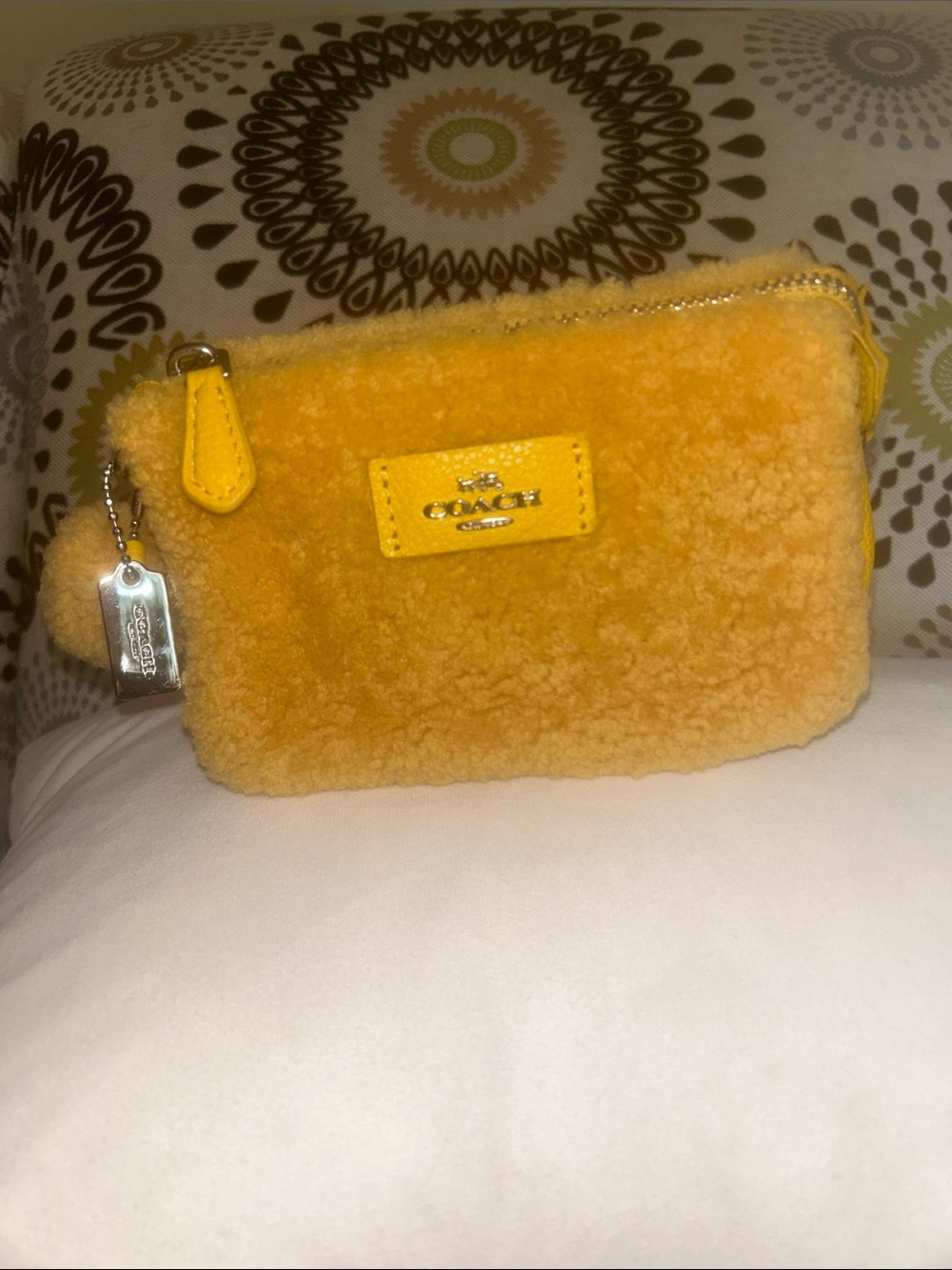 COACH Yellow Shearling Wristlet Pouch